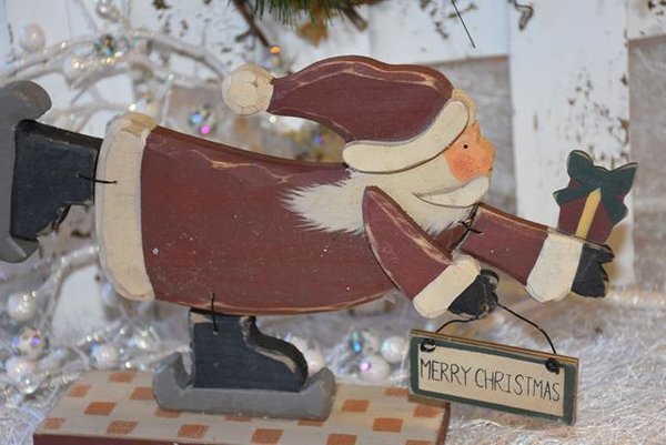 Weihnachtsmann / Schneemann mit Schlittschuhen