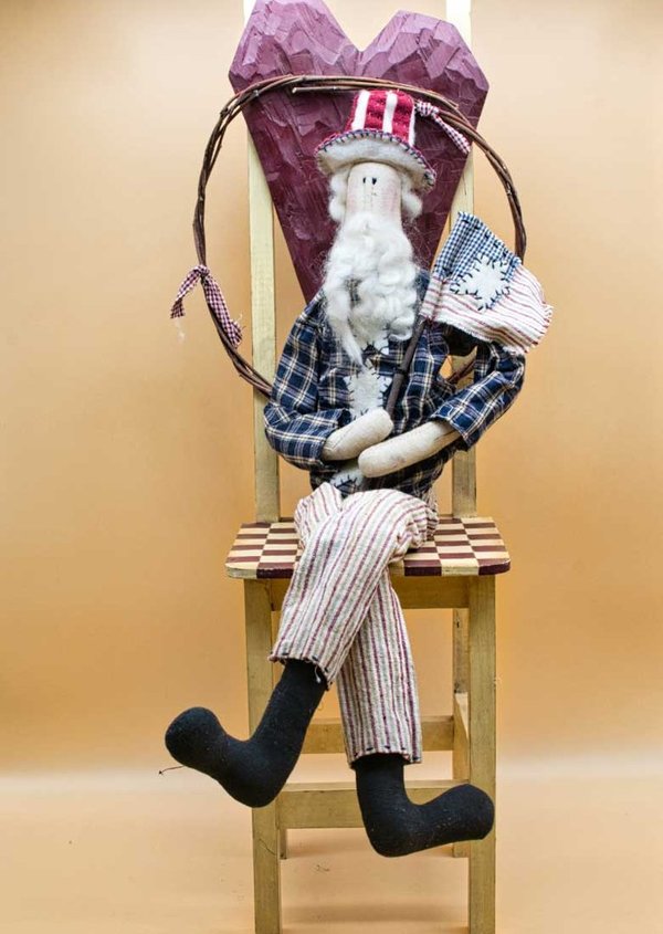 Weihnachtsmann im Folk-Art Stil mit amerikanischer Fahne und Hut